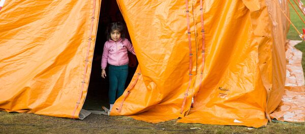 Des migrants Des migrants - Sputnik Afrique