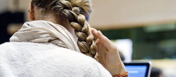 Une femme travaille Une femme travaille - Sputnik Afrique