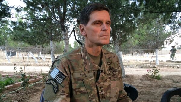Army Gen. Joseph Votel speaks to reporters Saturday, May 21, 2016 during a secret trip to Syria - Sputnik Afrique