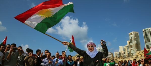 Syrian Kurd Nazdan who fled her home in Qamishli - Sputnik Afrique