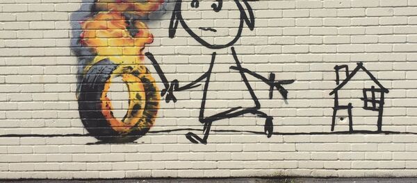 Le peinture de Banksy sur un mur d’une école primaire de Bristol - Sputnik Afrique