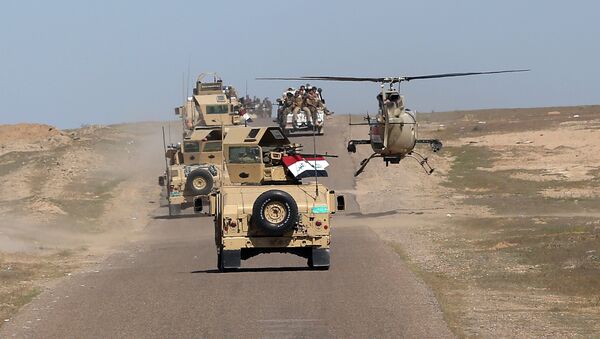 Le ministre irakien de la Défense Khaled al-Obeidi conduit des troupes vers une zone de combats contre  Daech - Sputnik Afrique