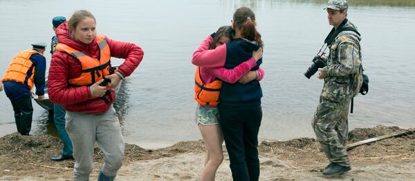 Les rescapés du naufrage sur le las Siamozero en Carélie - Sputnik Afrique