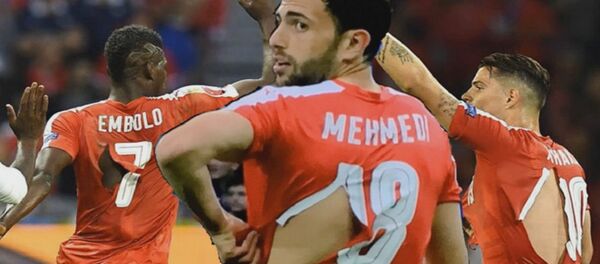 Les footballeurs suisses en maillots déchirés - Sputnik Afrique