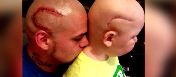 Josh J-Mash Marshall et son fils Gabriel Marshall - Sputnik Afrique