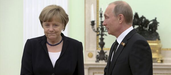 Angela Merkel et Vladimir Poutine - Sputnik Afrique