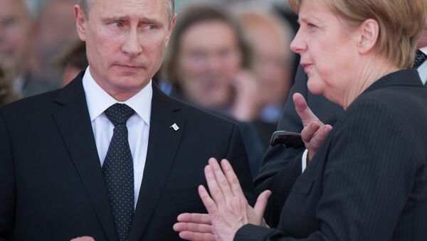 Angela Merkel et Vladimir Poutine - Sputnik Afrique