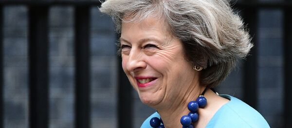 La secrétaire d'État britannique à l'Intérieur Theresa Mary May - Sputnik Afrique