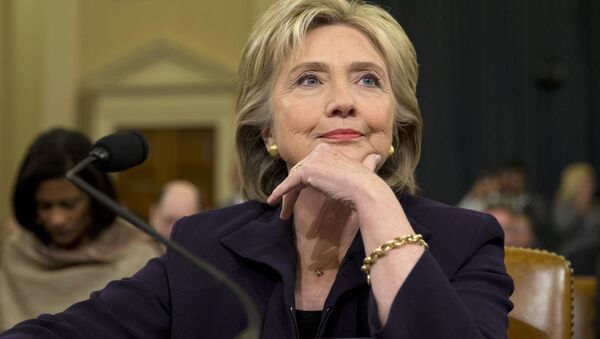 Democratic presidential candidate and former Secretary of State Hillary Rodham Clinton, listens as she testifies on Capitol Hill in Washington, Thursday, Oct. 22, 2015, before the House Select Committee on Benghazi - Sputnik Afrique