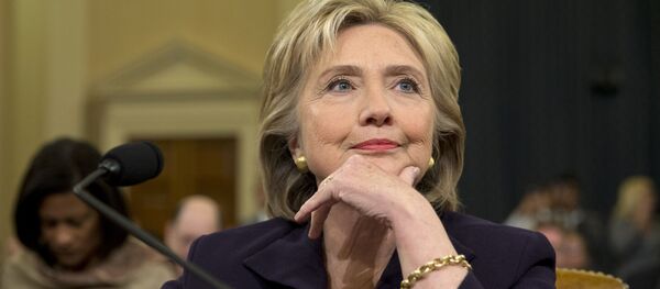 Democratic presidential candidate and former Secretary of State Hillary Rodham Clinton, listens as she testifies on Capitol Hill in Washington, Thursday, Oct. 22, 2015, before the House Select Committee on Benghazi - Sputnik Afrique