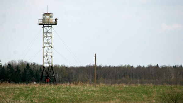 A Russian watchtower overlooks the disputed territories close to Pitalova region, near Vilaka, Latvia, Thursday, May 12, 2005. - Sputnik Afrique