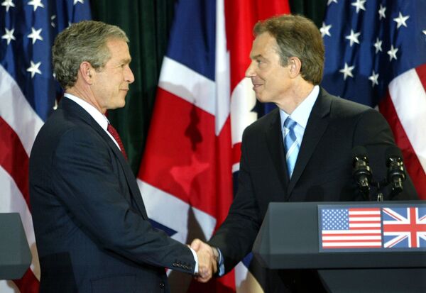 Rencontre du président américain George W. Bush et du premier ministre britannique Tony Blair. Photo d’archive. - Sputnik Afrique