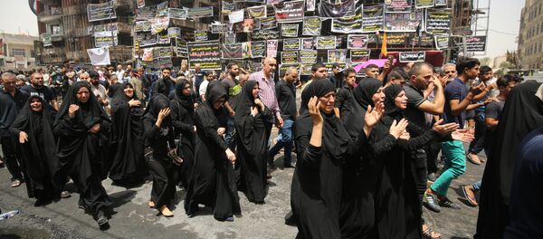 Hommage aux victimes d'un terrible attentat sanglant a frappé l’Irak - Sputnik Afrique