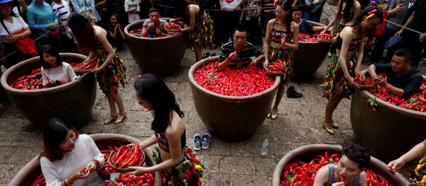 Un concours de mangeurs de piment en Chine Un concours de mangeurs de piment en Chine - Sputnik Afrique
