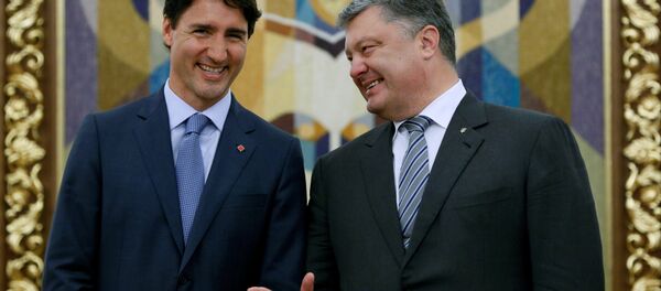 Justin Trudeau et Piotr Porochenko - Sputnik Afrique