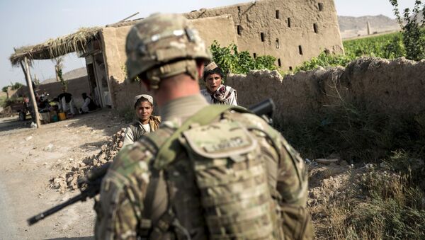 Un soldat américain près de l'aérodrome de Kandahar le 3 juin, 2014 - Sputnik Afrique