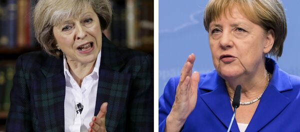 Theresa May VS Angela Merkel - Sputnik Afrique