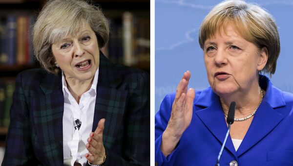 Theresa May VS Angela Merkel - Sputnik Afrique