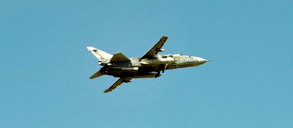Su-24 tactical bomber of the Russian air forces over the Hmeimim air base in the Lattakia province Su-24 tactical bomber of the Russian air forces over the Hmeimim air base in the Lattakia province - Sputnik Afrique