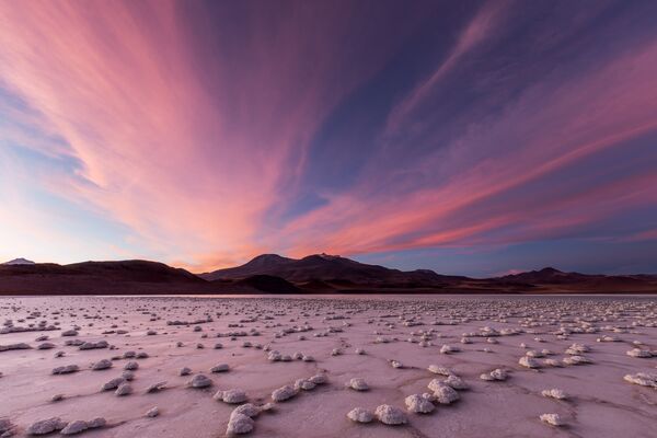 Un lever de Soleil dans la lagune Tuyajto dans le désert d'Atacama au Chili. - Sputnik Afrique
