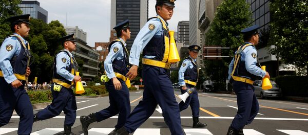 Des policiers à Tokyo - Sputnik Afrique