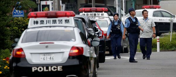 Police officers investigate near a facility for the disabled, where a deadly attack by a knife-wielding man took place, in Sagamihara, Kanagawa prefecture, Japan, July 26, 2016. - Sputnik Afrique