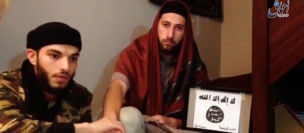 This still image taken from video shows the two men, Abdel-Malik Nabil Petitjean and Adel Kermiche, behind the church attack in Normandy in this video released July 28, 2016. Handout via Reuters - Sputnik Afrique