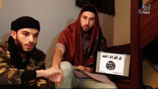 This still image taken from video shows the two men, Abdel-Malik Nabil Petitjean and Adel Kermiche, behind the church attack in Normandy in this video released July 28, 2016. Handout via Reuters - Sputnik Afrique