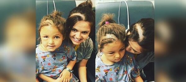 L'hommage touchant d'une mère à sa petite fille opérée - Sputnik Afrique