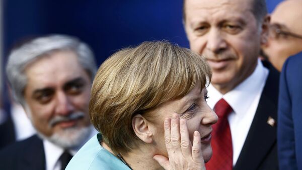 Bundeskanzlerin Angela Merkel und der türkische Präsident Recep Tayyip Erdogan - Sputnik Afrique