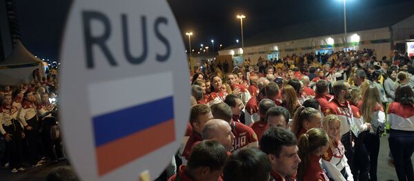 Церемония поднятия флагов в Олимпийской деревне - Sputnik Afrique