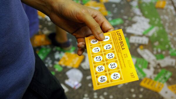 un billet de loterie - Sputnik Afrique