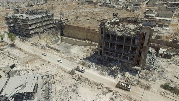 Bâtiments détruits dans le quartier de Bani Zeid dans le nord d'Alep - Sputnik Afrique