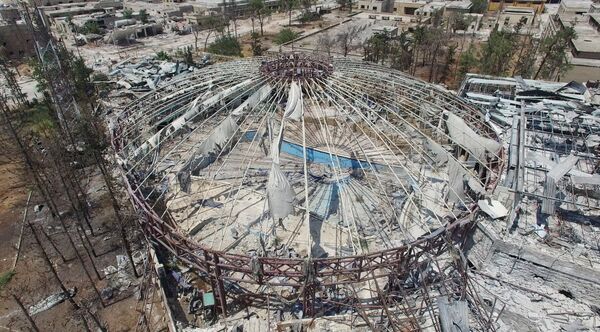 Bâtiment détruit dans le quartier de Bani Zeid dans le nord d'Alep - Sputnik Afrique