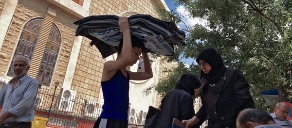 Dans le centre d'Alep, la vie continue - Sputnik Afrique