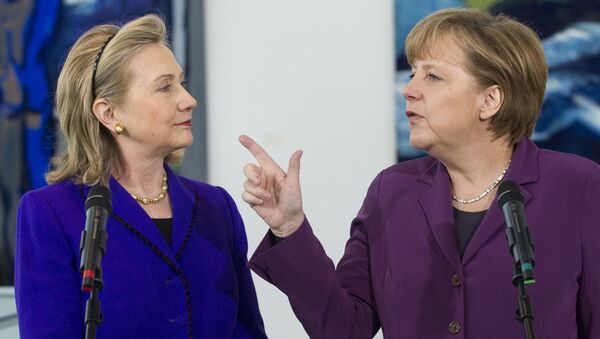Clinton et Merkel - Sputnik Afrique