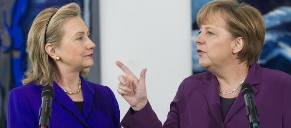 Clinton et Merkel - Sputnik Afrique
