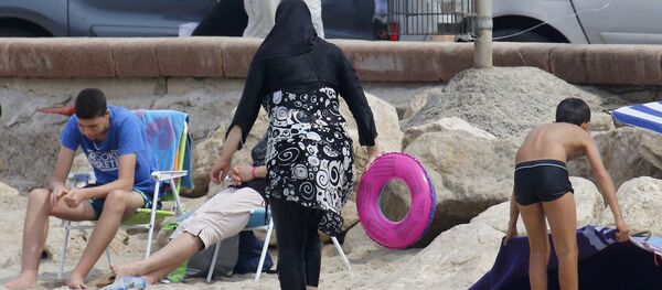 Une femme en burkini (image d'illustration) - Sputnik Afrique