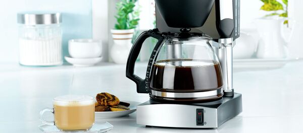 Une machine à café - Sputnik Afrique