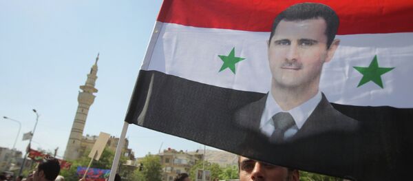 Meeting de soutien à Bachar el-Assad à Damas - Sputnik Afrique