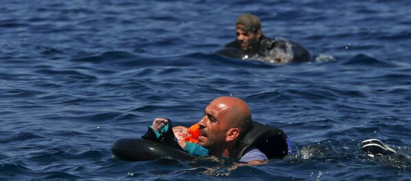 Des migrants - Sputnik Afrique