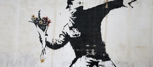 Une oeuvre de Banksy - Sputnik Afrique