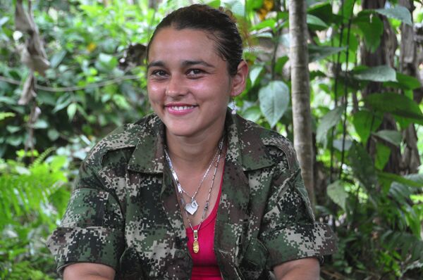Christine fait partie du groupe des FARC depuis plus de 7 ans et a participé à plusieurs combats Christine fait partie du groupe des FARC depuis plus de 7 ans et a participé à plusieurs combats - Sputnik Afrique