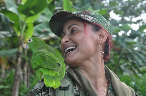 Patricia, chef de section, combattante depuis 20 ans déjà. Son fils de 11 ans habite avec sa sœur et sa mère à Medellin. Patricia, chef de section, combattante depuis 20 ans déjà. Son fils de 11 ans habite avec sa sœur et sa mère à Medellin. - Sputnik Afrique