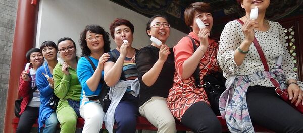 Ces Chinois qui vendent déjà… la glace de Poutine - Sputnik Afrique