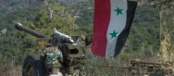 Syrian army artillery soldiers in Idlib province in northwestern Syria. file photo - Sputnik Afrique