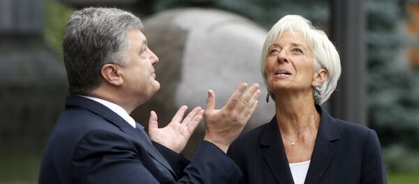 Der ukrainische Präsident Petro Poroschenko, IWF-Chefin Christine Lagarde Der ukrainische Präsident Petro Poroschenko, IWF-Chefin Christine Lagarde - Sputnik Afrique