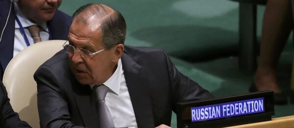 Russian Foreign Minister Sergei Lavrov confers with members of his delegation as U.S. President Barack Obama speaks during the 71st United Nations General Assembly in Manhattan, New York, U.S - Sputnik Afrique