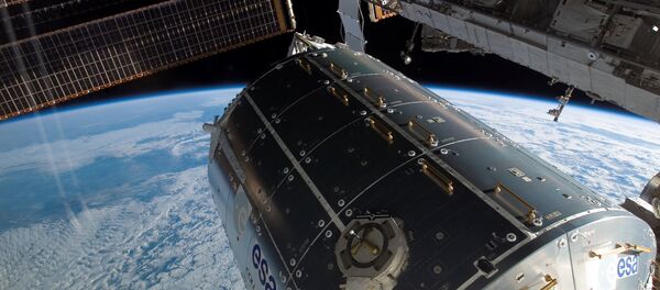 In this photo released by NASA on February 14, 2008, A view of the newly installed European Columbus module at the International Space Station on February 13, 2008. - Sputnik Afrique