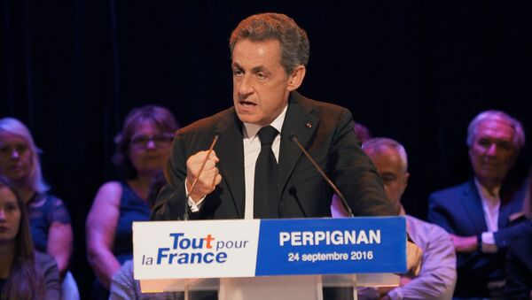 Former French president and candidate for Les Republicains presidential primary elections Nicolas Sarkozy delivers a speech during a campaign meeting in Perpignan, on September 24, 2016. - Sputnik Afrique